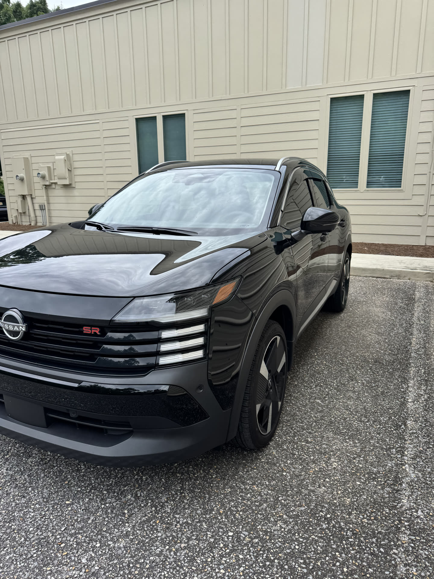 Coastal Lux 2025 Nissan Kicks SR in Gulf Shores Alabama — black exterior, SR badge