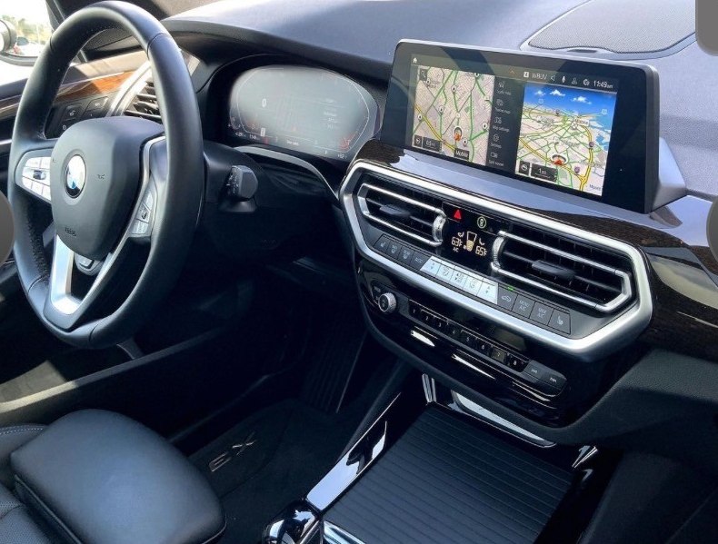 BMW X3 digital cockpit — instrument cluster and navigation touchscreen